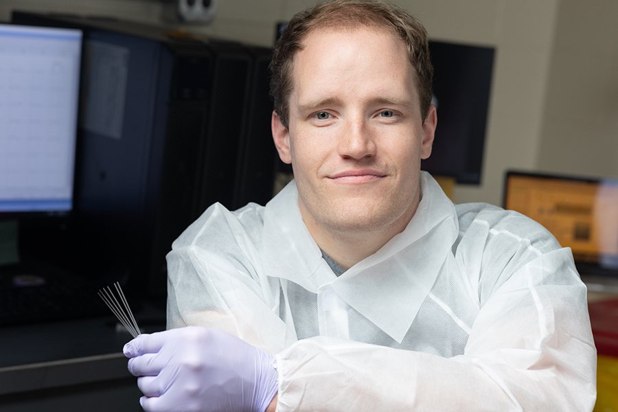 Image: Researcher Peter Christenson holds glass capillary tubes like those used in the study focusing on improving detection of neurodegenerative diseases (Photo courtesy of Thomas and Tonya Seiler, MNPRO)